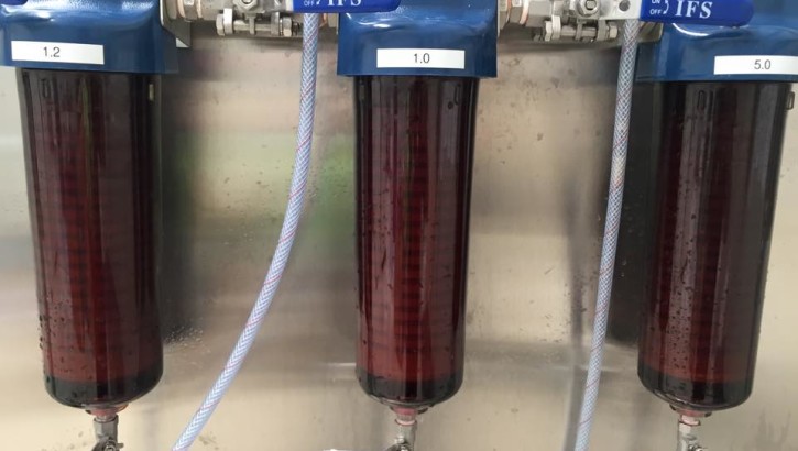 Filtering a dark brew (960x720)